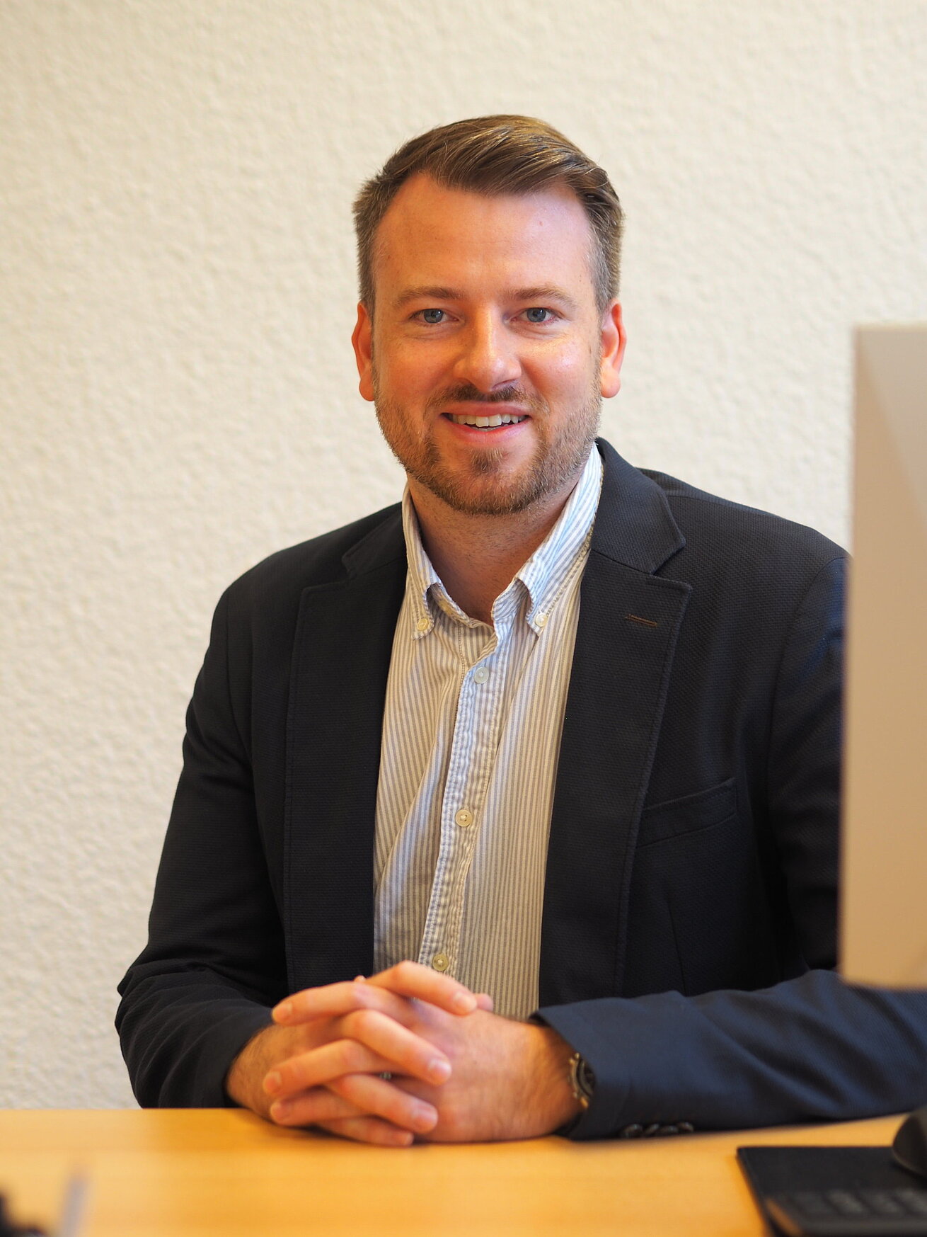 Porträtbild von Hendrik Neumann, Corporate Sales & Marketing Manager